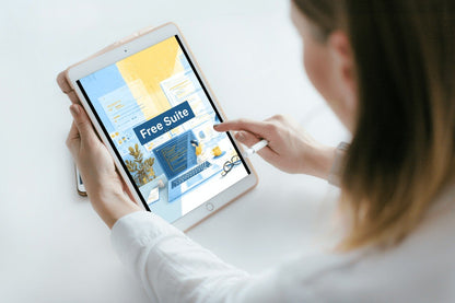 Person using a tablet with a free trial offer on the screen